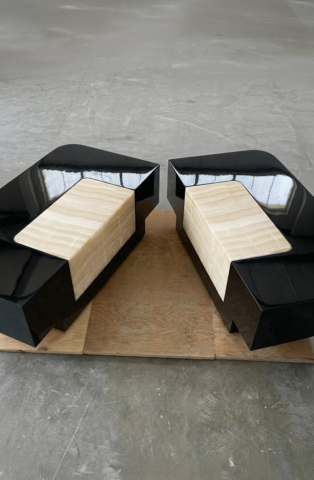 Italian Baci table in black onyx - luxury marble furniture with dramatic monochromatic design
