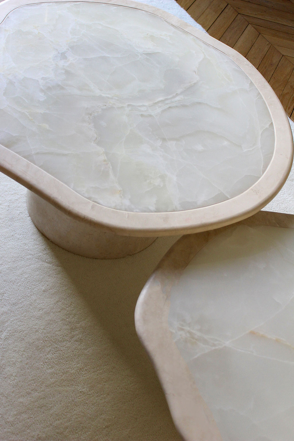 Detail view of Joan Solo onyx coffee table showcasing marble veining - handcrafted luxury furniture