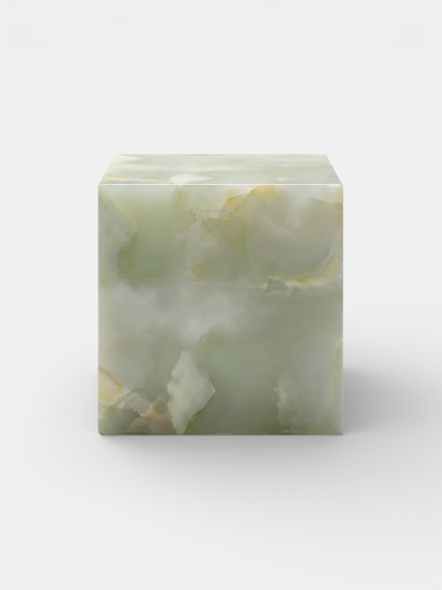 Italian green onyx cube front view displaying natural translucent emerald veining - luxury stone decor