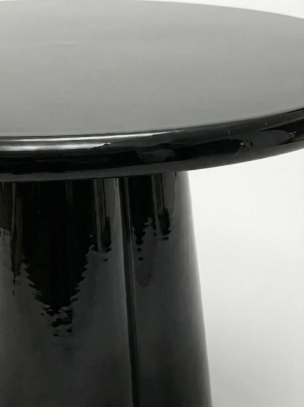 Elegant Poli black lacquered marble - handcrafted Italian furniture surface detail close-up view