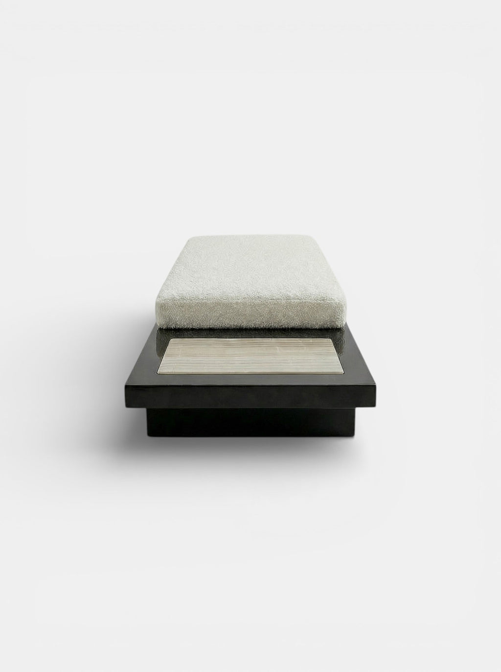 Detail angle of Sybille black ivory onyx bench revealing natural stone patterns and expert craftsmanship