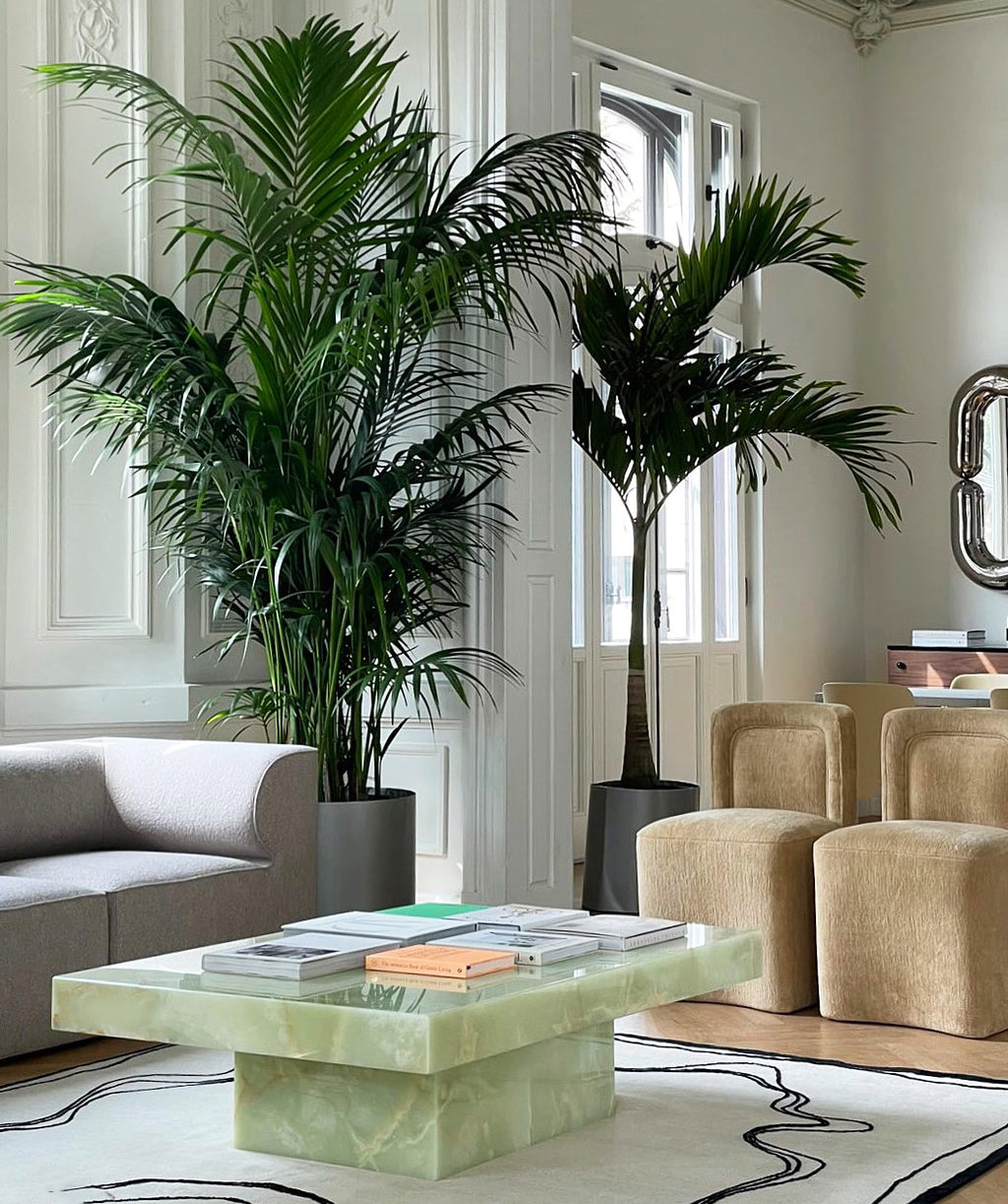 Green onyx Cara coffee table side view - Italian luxury marble furniture with translucent properties